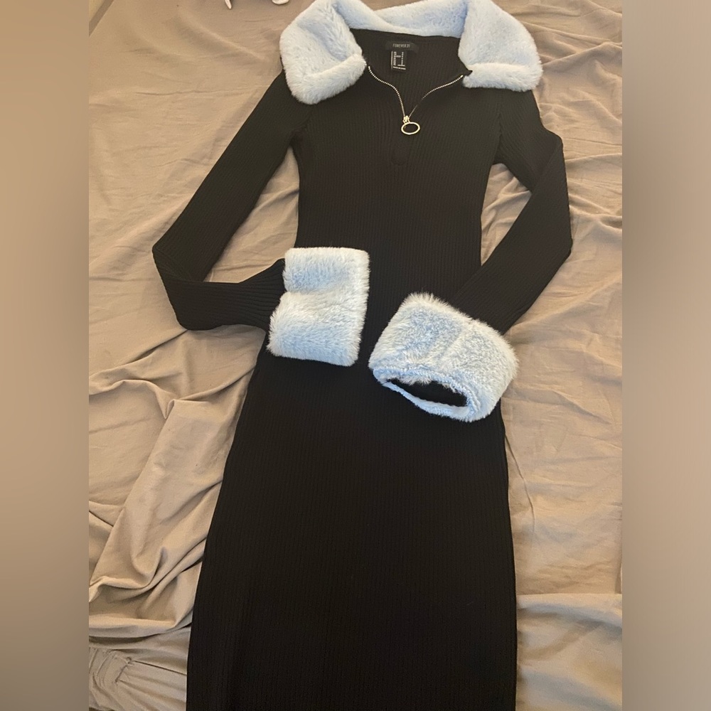 Forever 21 slim black dress with puff blue sleeves
